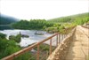 на фото: Мост через речку Тында
