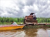 Технику возят по реке.