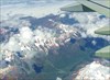 на фото: Кавказские горы из иллюминатора самолёта