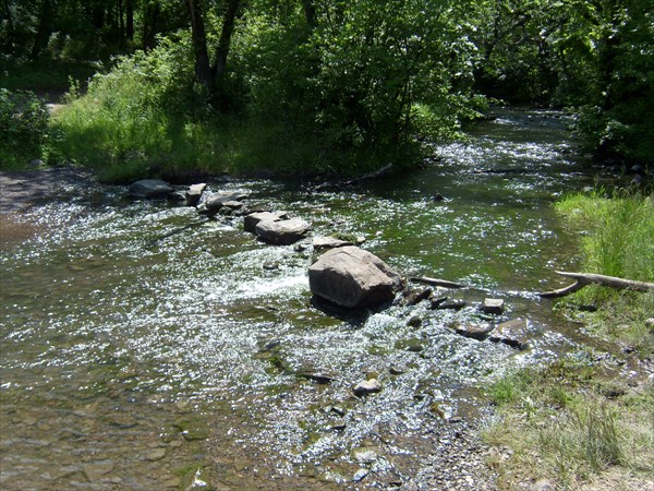 У скального массива.