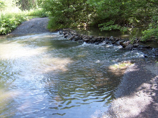 У скального массива.